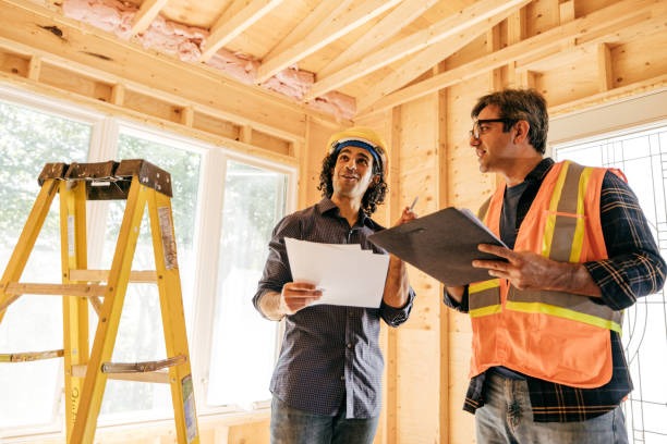 Two man standing in house for contracting