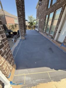 Beautiful brick home with newly poured concrete patio.