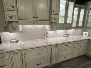 Versatile, classic kitchen cabinet design with granite countertops for home renovation.