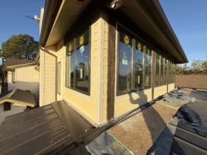Bright, energy-efficient windows and new roofing enhance home exterior and value.