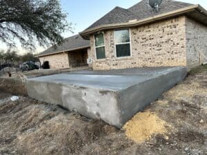 Concrete foundation for new home or addition installation. Professional grading, pouring, and finishing services.