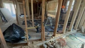 Basement construction with framing, electrical wiring, and renovation by Salvation Home Remodeling.